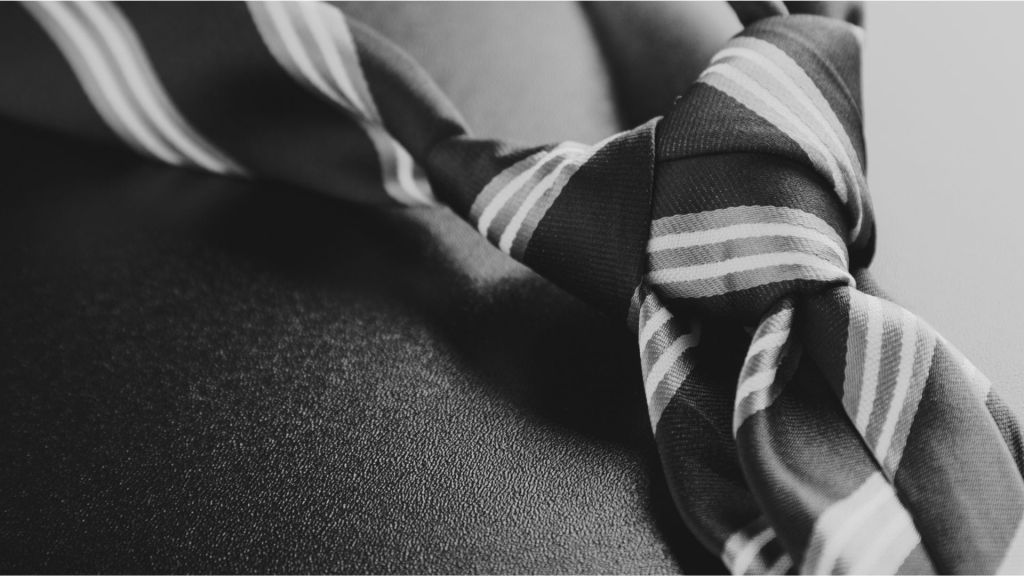 A greyscale picture of a striped tie